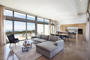 Kuchyň nebo kuchyňský kout v ubytování Minthis Resort
