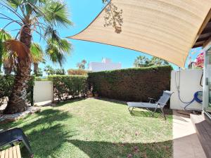 A garden outside Baria I Adosado