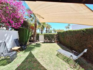 A garden outside Baria I Adosado
