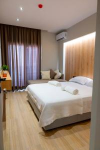 Postel nebo postele na pokoji v ubytování RiA BLU DELUXE HOTEL
