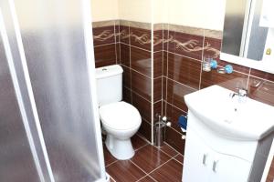 Koupelna v ubytování Hotel Ultra Star