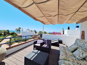A balcony or terrace at Baria I Adosado