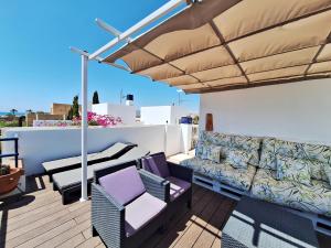 A balcony or terrace at Baria I Adosado