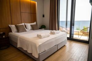 Postel nebo postele na pokoji v ubytování RiA BLU DELUXE HOTEL