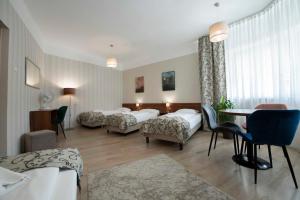 Posteľ alebo postele v izbe v ubytovaní Hotel Polonia