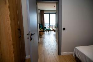 Postel nebo postele na pokoji v ubytování RiA BLU DELUXE HOTEL