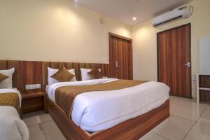 Voodi või voodid majutusasutuse Radhe Krishna Resort toas