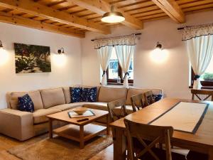 a living room with a couch and a table at U Johanky in Terchová