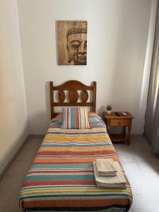 Postel nebo postele na pokoji v ubytování Hostal La Masia