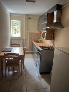 A kitchen or kitchenette at Harsányi vendégház