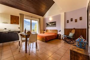 Posteľ alebo postele v izbe v ubytovaní Case Appartamenti Vacanze Da Cien