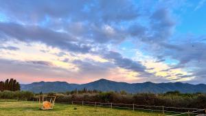 a field with a goal in a field with mountains at Le Mas Del Cargol in Palau-del-Vidre