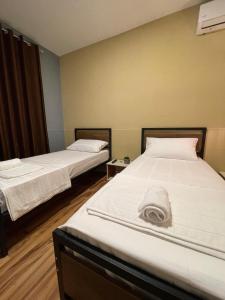 Postel nebo postele na pokoji v ubytování Eja Mare Guest House
