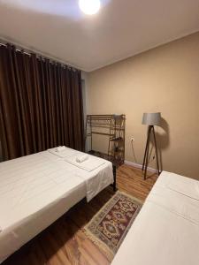 Postel nebo postele na pokoji v ubytování Eja Mare Guest House