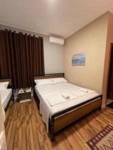 Postel nebo postele na pokoji v ubytování Eja Mare Guest House