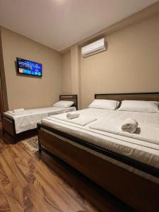 Postel nebo postele na pokoji v ubytování Eja Mare Guest House