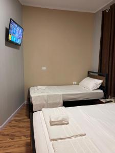 Postel nebo postele na pokoji v ubytování Eja Mare Guest House