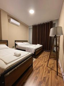 Postel nebo postele na pokoji v ubytování Eja Mare Guest House