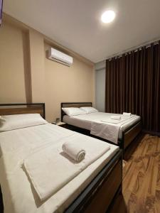 Postel nebo postele na pokoji v ubytování Eja Mare Guest House