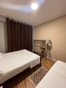 Postel nebo postele na pokoji v ubytování Eja Mare Guest House
