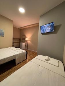 Postel nebo postele na pokoji v ubytování Eja Mare Guest House