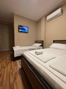 Postel nebo postele na pokoji v ubytování Eja Mare Guest House