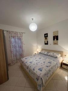 Posteľ alebo postele v izbe v ubytovaní Apartments Mais Tisno