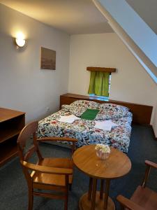 Postel nebo postele na pokoji v ubytování Apartmány BAROKO