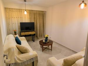 TV a/nebo společenská místnost v ubytování Tropico House