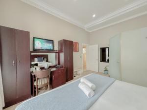 Amoris In Sea Point客房内的一张或多张床位