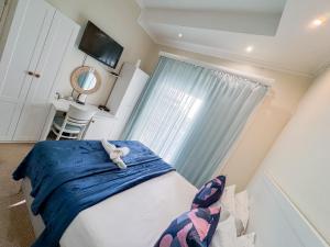 Amoris In Sea Point客房内的一张或多张床位