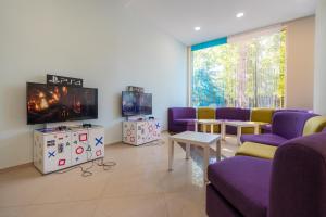 TV a/nebo společenská místnost v ubytování MPM Hotel Orel - Ultra All Inclusive