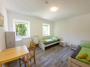 Posteľ alebo postele v izbe v ubytovaní Apartments in Grüner Umgebung