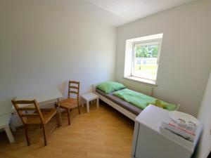 Posteľ alebo postele v izbe v ubytovaní Apartments in Grüner Umgebung