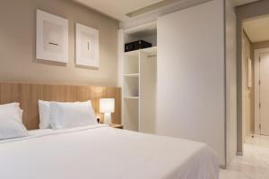 Voodi või voodid majutusasutuse The Code Residence - ذا كود ريزيدنس toas