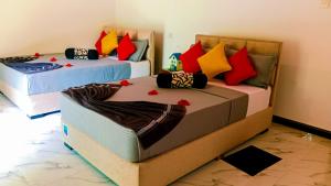 Letto o letti in una camera di Sigiri Thilanka Rest Sigiriya