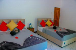 Letto o letti in una camera di Sigiri Thilanka Rest Sigiriya
