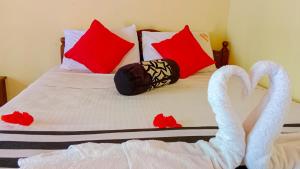 Letto o letti in una camera di Sigiri Thilanka Rest Sigiriya