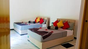 Letto o letti in una camera di Sigiri Thilanka Rest Sigiriya