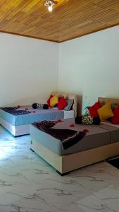 Letto o letti in una camera di Sigiri Thilanka Rest Sigiriya