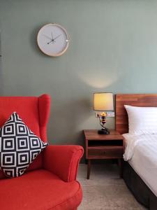 Łóżko lub łóżka w pokoju w obiekcie Kenting Cozy B&B