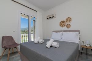 Postel nebo postele na pokoji v ubytování Maria Hotel + 34 fotografií
