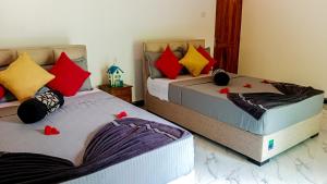 Letto o letti in una camera di Sigiri Thilanka Rest Sigiriya