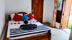 Letto o letti in una camera di Sigiri Thilanka Rest Sigiriya