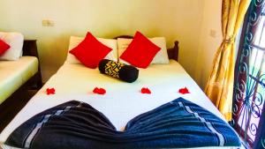 Letto o letti in una camera di Sigiri Thilanka Rest Sigiriya