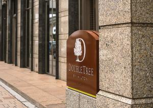 Certifikát, hodnocení, plakát nebo jiný dokument vystavený v ubytování DoubleTree by Hilton Naha