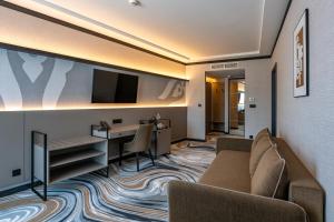 TV a/nebo společenská místnost v ubytování Hotel Debrecen