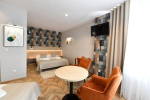 Posteľ alebo postele v izbe v ubytovaní Hotel Polonia
