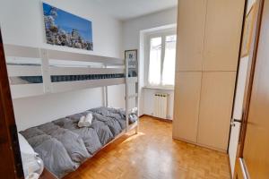 Postel nebo postele na pokoji v ubytování Trilocale in centro a Cormons con balcone e garage