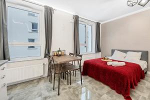 En eller flere senge i et værelse på Lumina comfy apart near the railway station